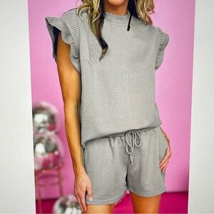 Brand new! Boutique textured flutter sleeve top and shorts set